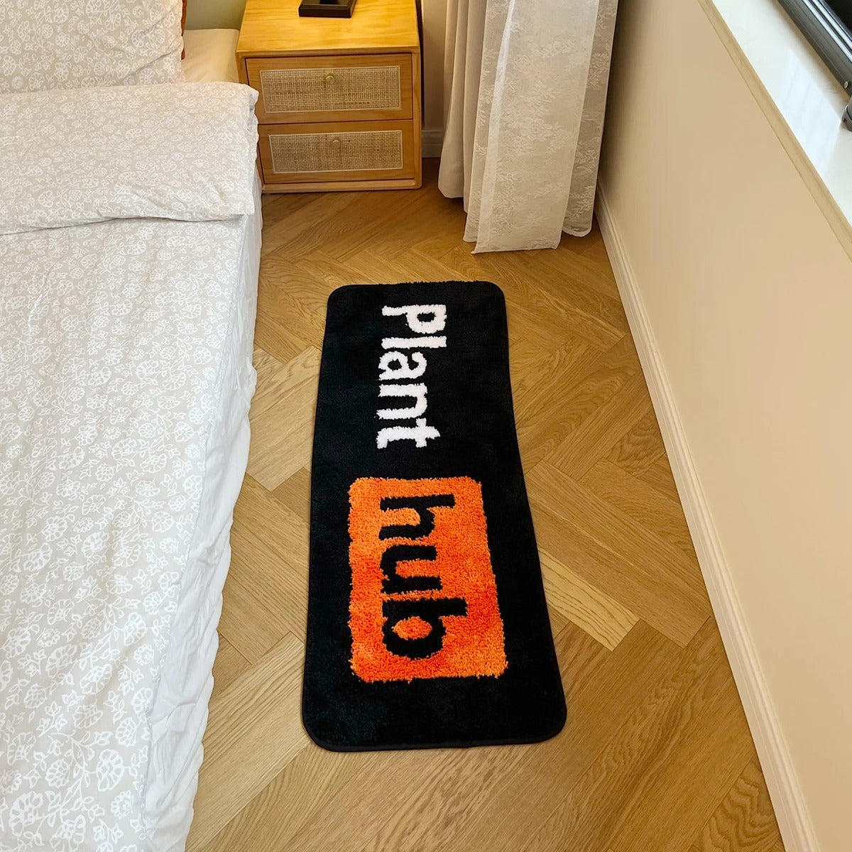 Black Orange 'Planthub' Tufted Rug