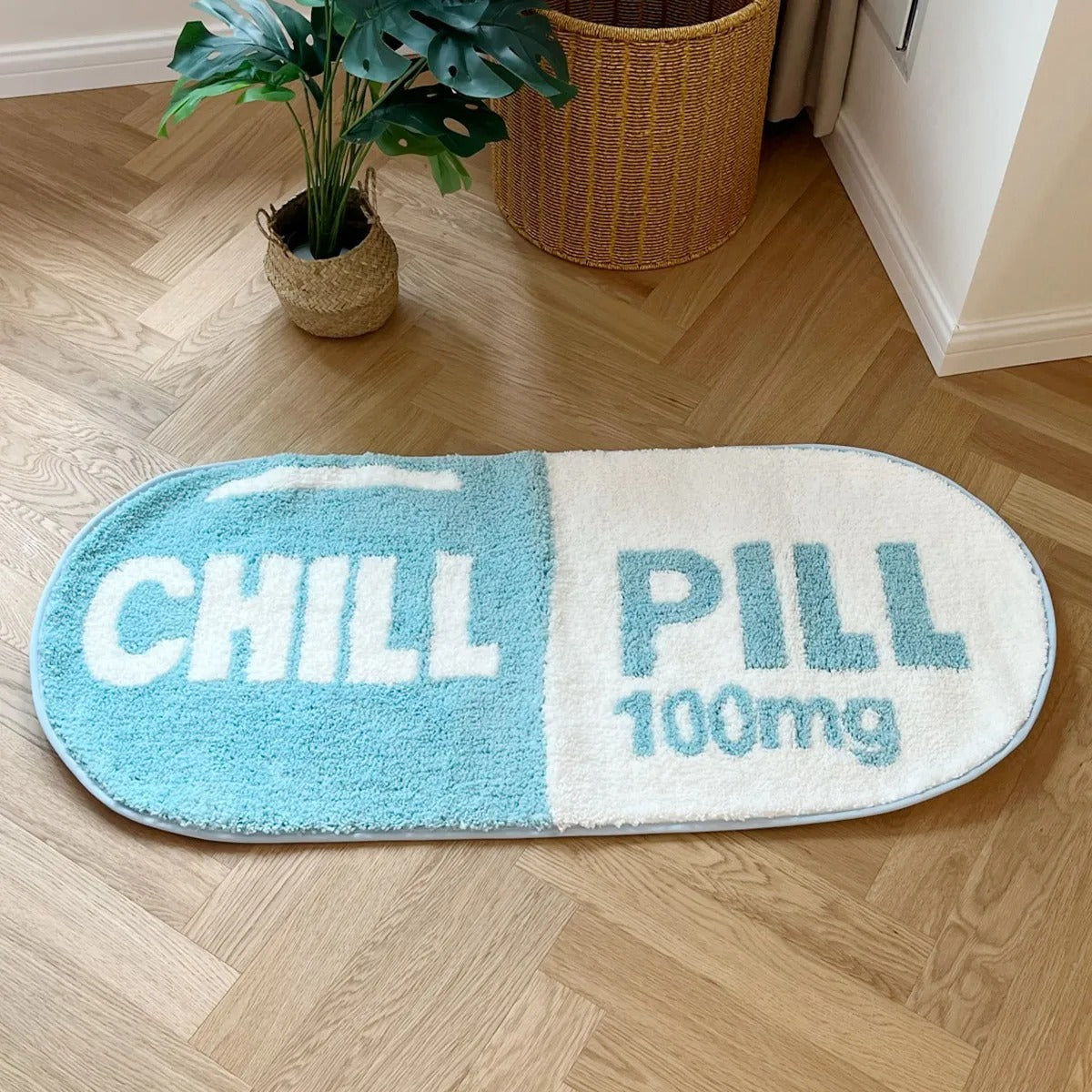 Pink Blue 'Chill Pill' 100mg Oval Tufted Rug