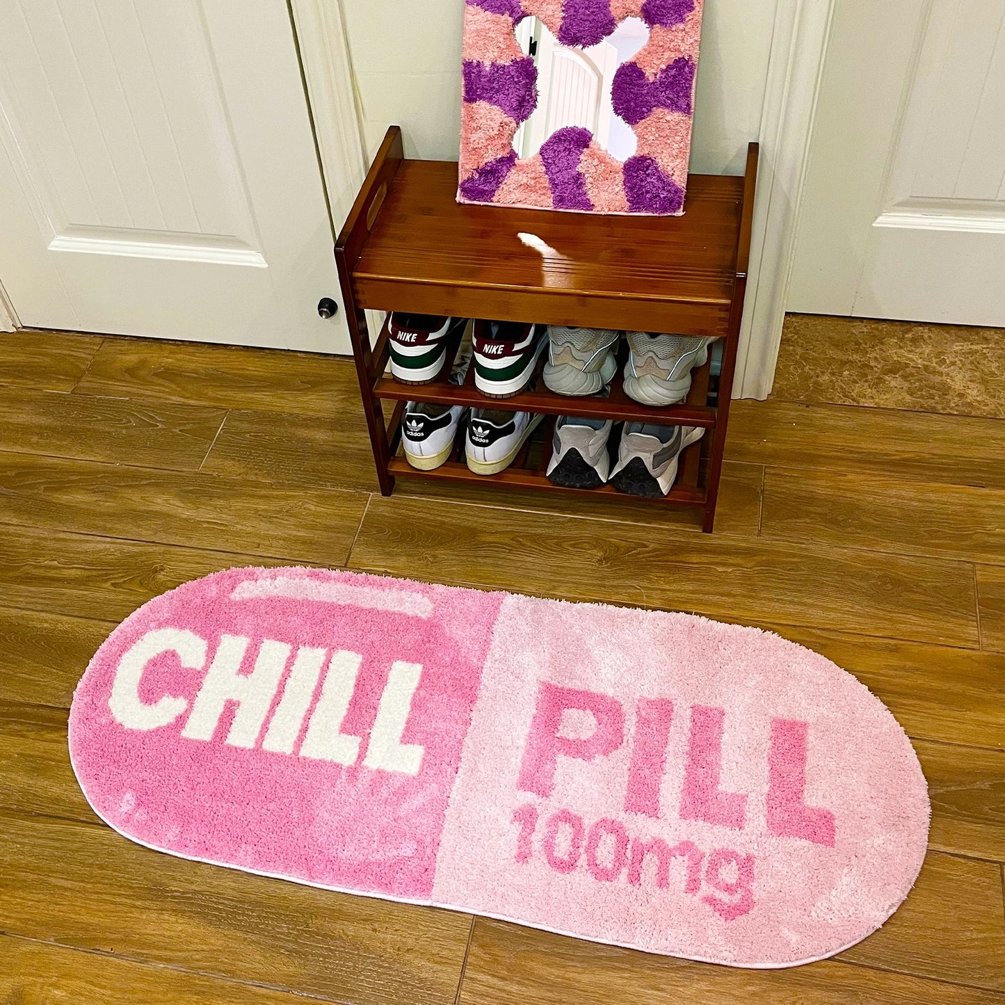 Pink Blue 'Chill Pill' 100mg Oval Tufted Rug
