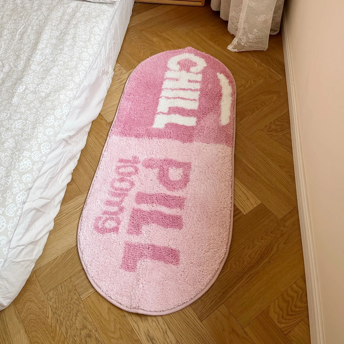 Pink Blue 'Chill Pill' 100mg Oval Tufted Rug