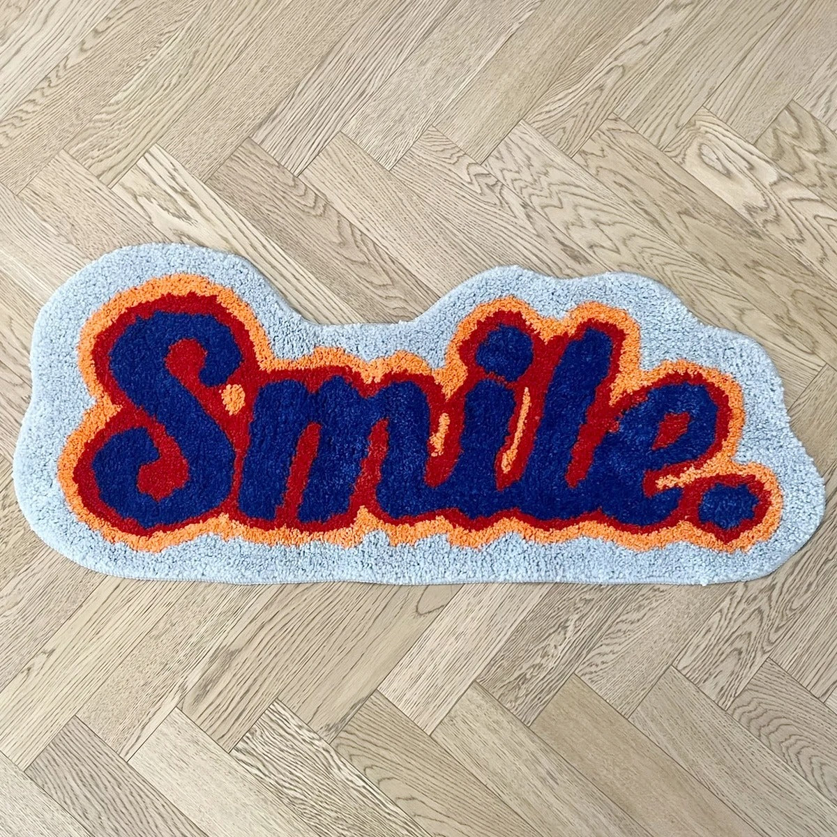 Positivity 'Smile' Text Tufted Rug
