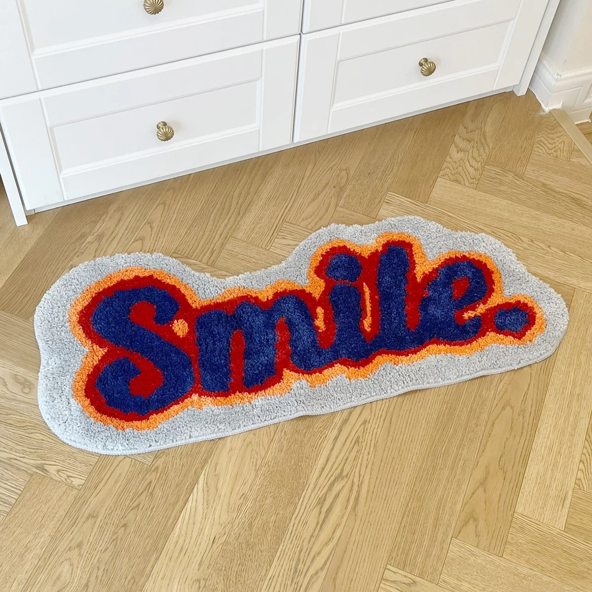 Positivity 'Smile' Text Tufted Rug
