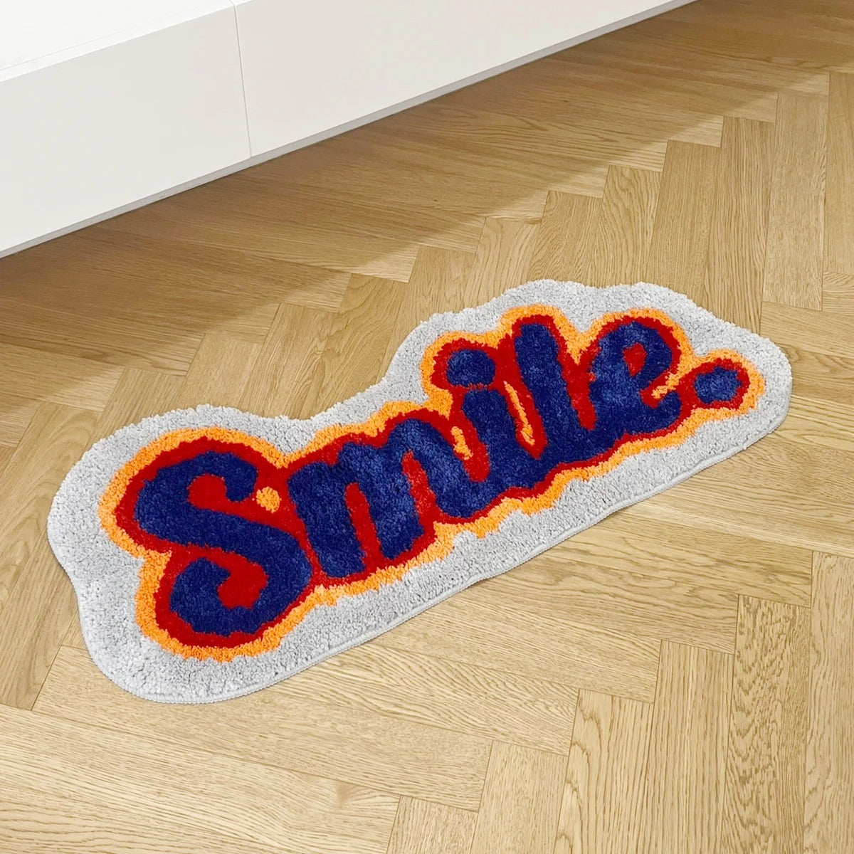 Positivity 'Smile' Text Tufted Rug